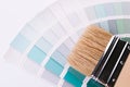 Paint brushes placed on top of can filled with blue paint Royalty Free Stock Photo