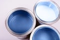 Paint brushes placed on top of can filled with blue paint. Classic blue color of year 2020. Royalty Free Stock Photo