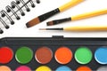 Paint brushes and sketch book Royalty Free Stock Photo