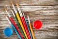 Paint brushes on wooden background, special tools for creative p