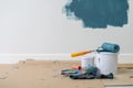 Paint bucket with roller, glove and brush Royalty Free Stock Photo