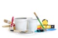 Paint cans and tools on white background Royalty Free Stock Photo