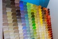 Paint color swatches on display in a painting store