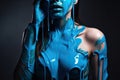 paint drips from the woman body, blue liquid drops on beautiful model girl`s body, creative abstract