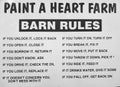 Fun sentance barn rules print on the wall Royalty Free Stock Photo