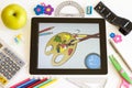 Paint on Ipad 3 and school accesories Royalty Free Stock Photo