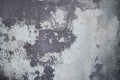 The paint is peeling off, falling apart, Damaged wall, background and texture Royalty Free Stock Photo