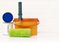 Paint roller, paint bucket and paint cans Royalty Free Stock Photo