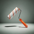 Paint roller tool with orange handle and white roller ready for home improvement projects Royalty Free Stock Photo
