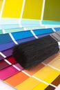 Paint swatches and paintbrush close up Royalty Free Stock Photo