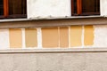 Paint test samples on a building wall. Trying various paint types, picking colours in process of conservatiom, tenement house Royalty Free Stock Photo