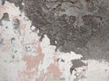 Abstract Dark Grunge wall texture background. Paint cracking off dark wall with rust underneath.distressed crackled texture. Royalty Free Stock Photo
