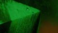 paint water drip neon dust flow green glitter cube