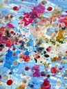 Sparkling silvery pink blue wax splashes, paint abstract creative background Royalty Free Stock Photo
