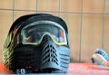 Paintball equipment. A protective helmet, complete with a mask to protect the face