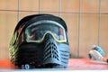 Paintball equipment. A protective helmet, complete with a mask to protect the face