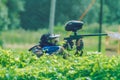 Paintball game battle, players and guns. Latvia, Cesis. 2012