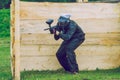 Paintball game battle, players and guns. Latvia, Cesis. 2012