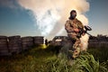 Paintball man epic standing in smoke outdoor