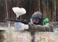 Paintball player in shooting Royalty Free Stock Photo