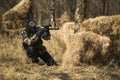 Paintball player shooting Royalty Free Stock Photo