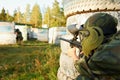 Paintball player under attack Royalty Free Stock Photo