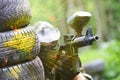 Paintball player under gunfire Royalty Free Stock Photo