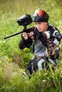 Paintball shooter aiming the gun Royalty Free Stock Photo
