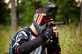 Paintball shooter in the field Royalty Free Stock Photo