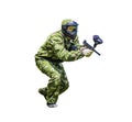 Paintball sport player in protective uniform and mask playing paintball with gun isolated on white background Royalty Free Stock Photo
