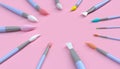 Paintbrush artistic tools closeup on canvas for artwork in art studio and pastel pink color background