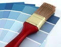 Paintbrush and Blue Paint Samples Royalty Free Stock Photo