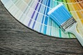Paintbrush color sampler on wood board