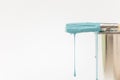 Paintbrush dripping blue paint Royalty Free Stock Photo