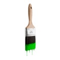 Paintbrush loaded with green color dripping off the bristles.