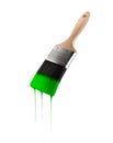 Paintbrush loaded with green color dripping off the bristles.