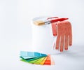 Paintbrush, paint pot, gloves and pantone samplers