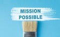 A paintbrush with the word Mission Possible written on it. Royalty Free Stock Photo