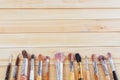Paintbrushes and art tools on a wooden table background Royalty Free Stock Photo
