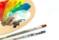 Paintbrushes and colors on palet Royalty Free Stock Photo