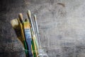 Paintbrushes in a glass jar