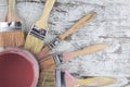 Paintbrushes and paint can in a wood background Royalty Free Stock Photo