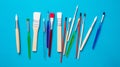 Paint brushes new clean isolated against blue background Royalty Free Stock Photo