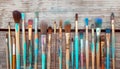 Painted art brushes lined up neatly on wood, world art day photography Royalty Free Stock Photo