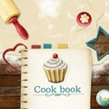 Painted baking background: dough, rolling pin, cookie cutters and cookbook with bookmarks