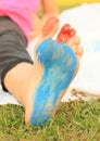 Painted bare foot of a little kid - girl