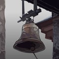 Painted the bell attached to the roof of the building