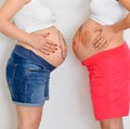 Painted belly of pregnant  women Royalty Free Stock Photo