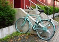 Painted bicycle locked to railing Royalty Free Stock Photo