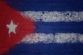 painted big national flag of cuba on a massive old brick wall Royalty Free Stock Photo